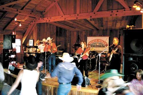 Monte Mills and the Lucky Horsehoe Band performing at the Hospice 'Pardners' Hoedown at the Hearst Ranch